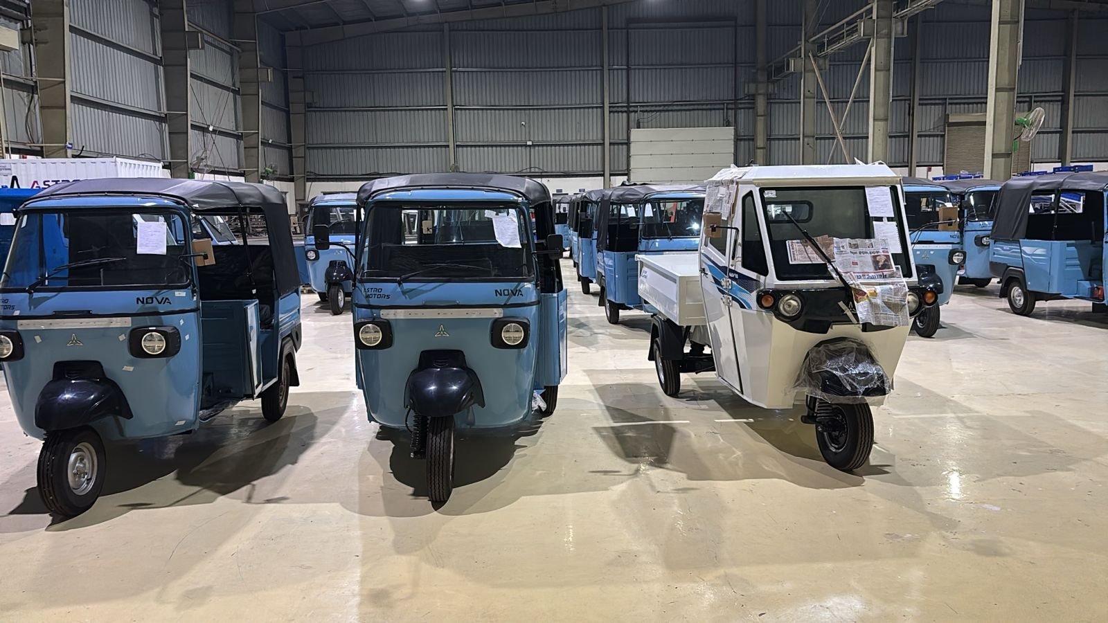 Nova passenger rickshaws lined up on the Astro Motors factory floor