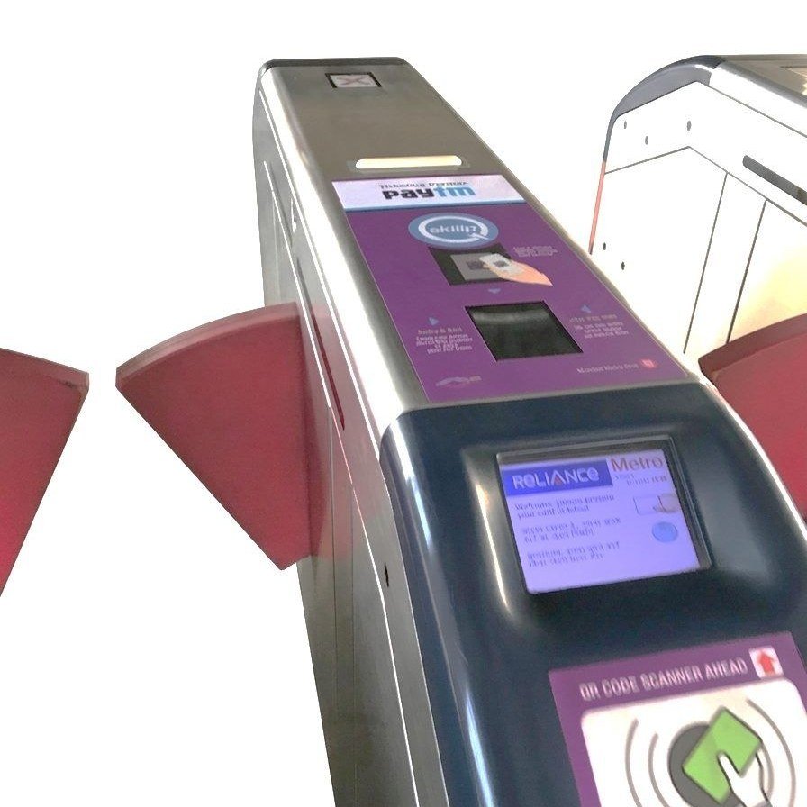 The Ridlr validator on a Mumbai Metro gate, screen lit