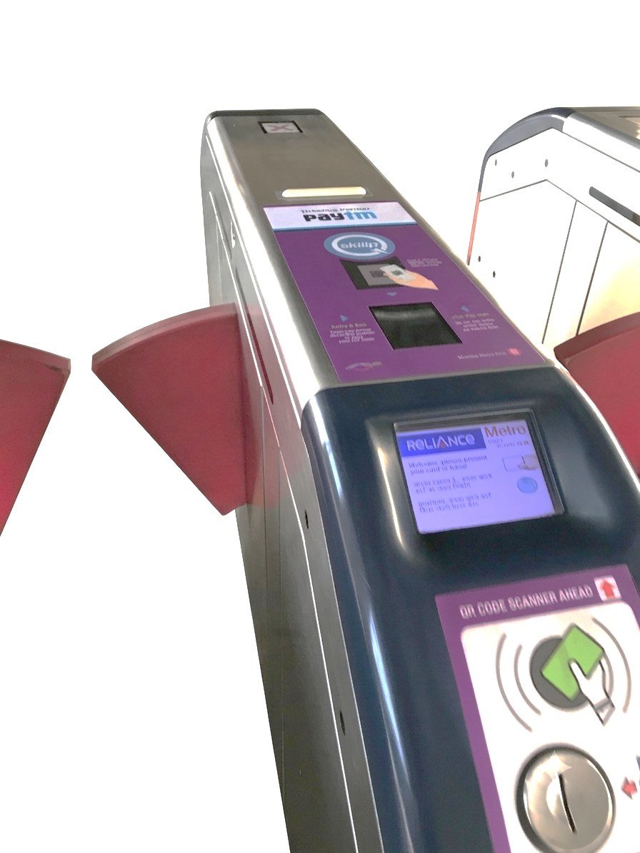 The Ridlr validator unit photographed on the Mumbai Metro AFC gate, above the red flap